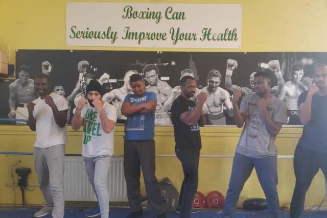Some regulars take part in a Boxing Well session.