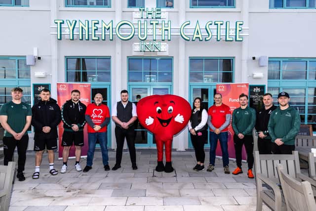 Stuart Jackson and David Brind, along with squad members of the Newcastle Falcons and staff of The Tynemouth Castle Inn. Picture: Chris Lishman