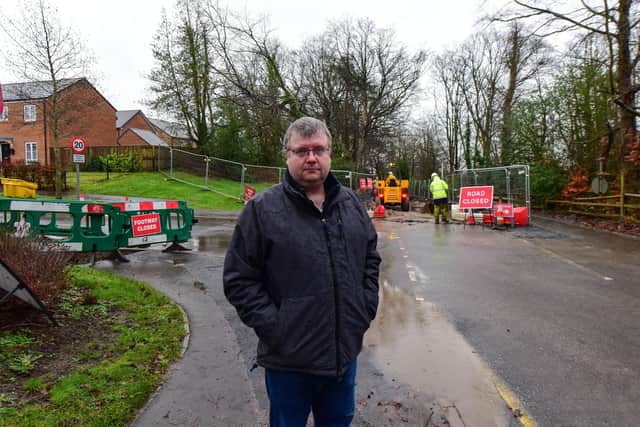 James Elliott has been representing the residents of the new Saint Georges Wood estate in Morpeth, who are angry about the time it is taking to repair the access road to their homes. Picture by Kevin Brady.