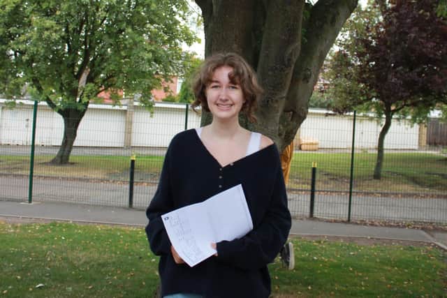 A delighted student with her A-level results.