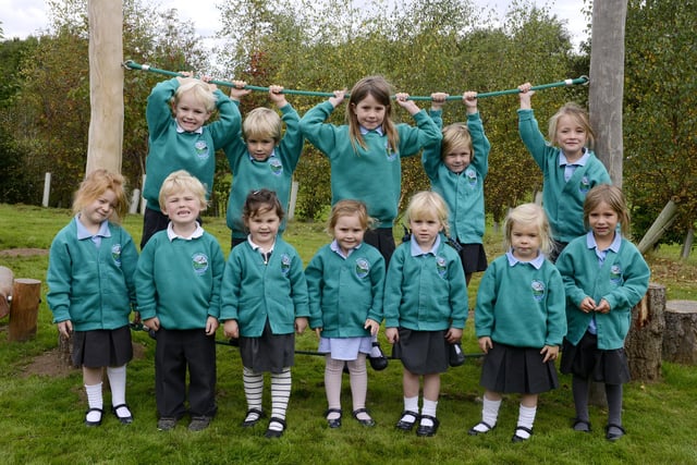 The new pupils at Branton First School are seen in their new uniforms on their new play outdoor play equipment.