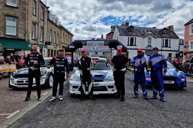 The winners of the Jim Clark Rally celebrate in the square at Duns.