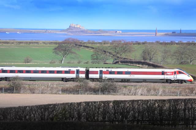 An LNER Azuma train speeds past Holy Island. Picture: LNER