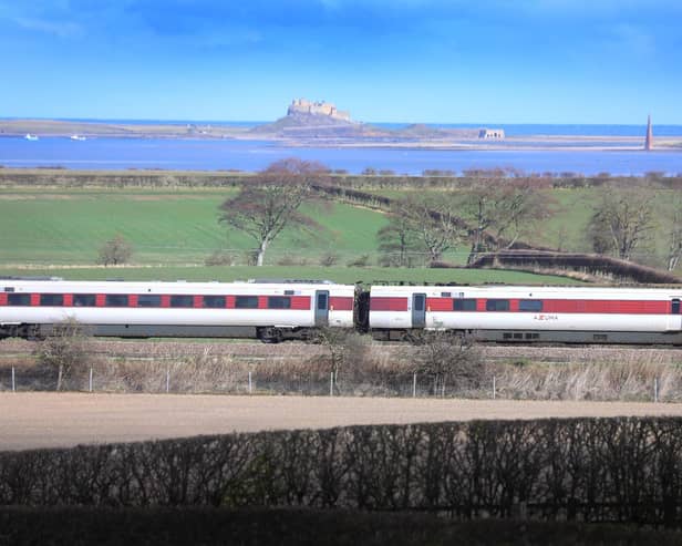 An LNER Azuma train speeds past Holy Island. Picture: LNER