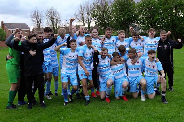Champions - Alnwick Town Development celebrate winning the North Northumberland League.