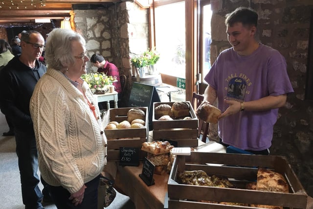 Jack Howe explains his home-made sourdough bread to Fiona Stott.