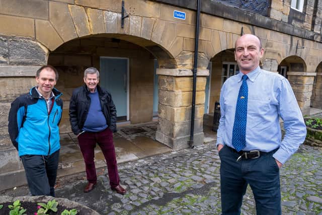 Councillors Martin Swinbank, Gordon Castle and John Riddle outside The Shambles public toilets in Alnwick.
