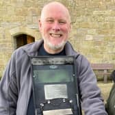 Steve Lowe, left, volunteer Dave Bone and a section of the replica Enigma machine.