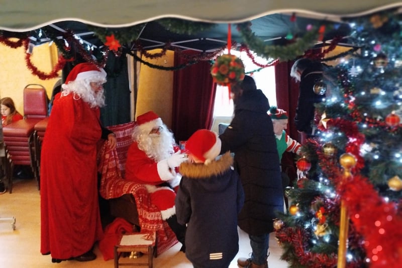 At Santa’s grotto in the Town Hall, all children who visited him and his elves received a present.