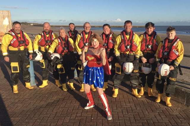 Berwick Lifeboat crew supported by Wonder Woman.