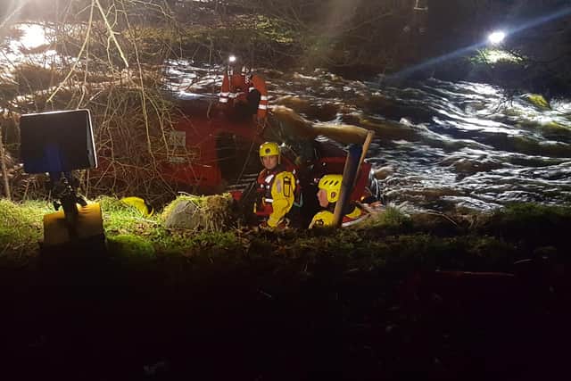 Emergency service workers rescue man on top of Royal Mail van swept away from ford crossing