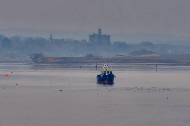 A view of Warkworth from Amble.