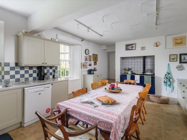 The kitchen retains a traditional country house feel.
