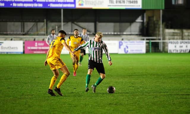 Young Blyth Spartans forward Jamie Clark in action against Boston United. (Photo credit: Steve Betts)