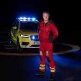 Dr Mike Davison in front of the rapid response vehicle.