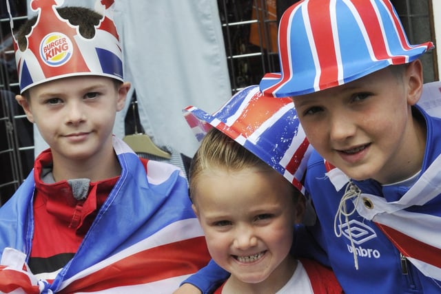Harrison Rex, Abby Coulter and Jacob Coulter at  Amble's Diamond Jubilee parade.