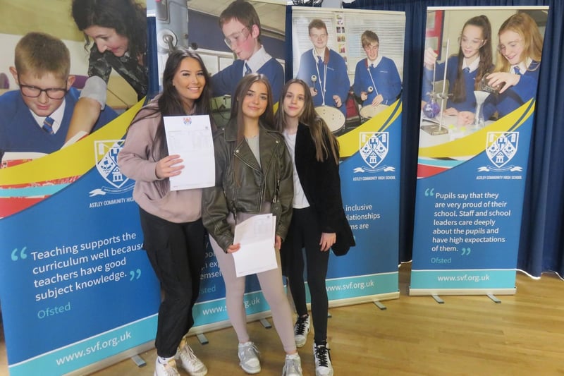 Grace H, Frankie D, and Beth W celebrate their results. (Photo by Astley Community High School)