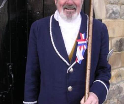 Alnwick historian Adrian Ions dressed as a town waite.