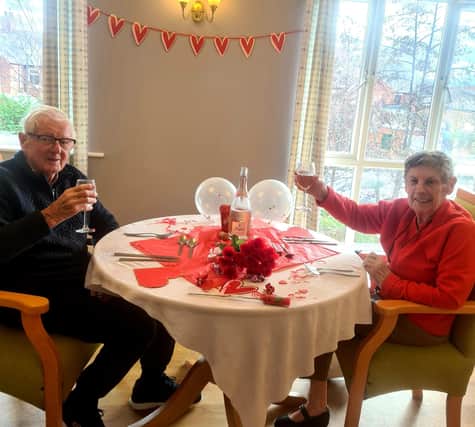 Ronnie and Jean enjoy their Valentine's Day meal together at Station Court care home.