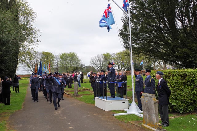Air Commodore Richard Corney takes the salute at the march past.