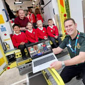 NEAS engagement manager Mark Johns with Shotley Bridge Primary School pupils and deputy head teacher Mr Patterson.