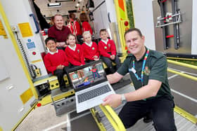NEAS engagement manager Mark Johns with Shotley Bridge Primary School pupils and deputy head teacher Mr Patterson.