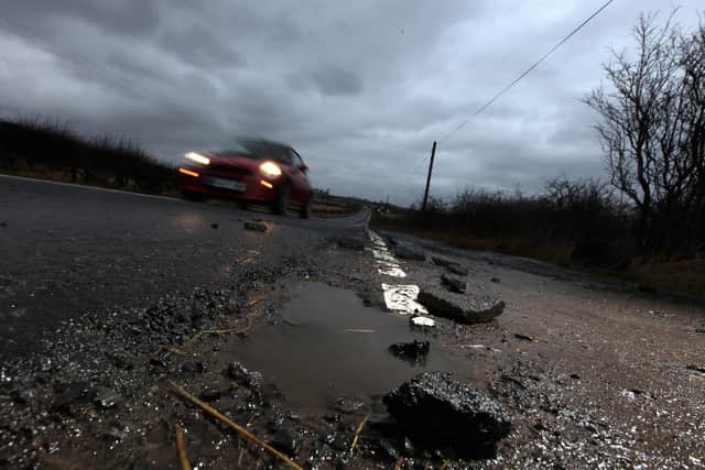 Potholes in Northumberland following heavy snow.
