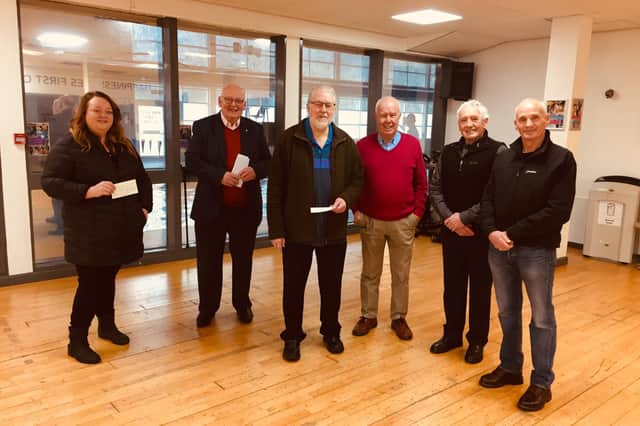Morpeth Sports Council committee members present cheques to representatives of The Mary Hollon Trust and Stobhill Link. Donations to the two other organisations were made separately.