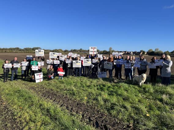 Protesters at the site of the proposed housing development, on the outskirts of Ashington.