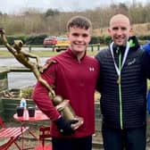 Connor Marshall, Carl Avery and Sam Hancox, members of Morpeth's winning team with the Royal Signals Relays trophy on Saturday.