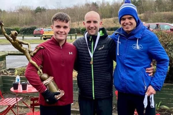 Connor Marshall, Carl Avery and Sam Hancox, members of Morpeth's winning team with the Royal Signals Relays trophy on Saturday.