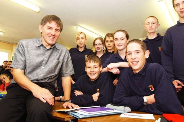Newcastle United and England footballer Peter Beardsley talks to pupils from Duchess's High School, Alnwick, during their Career Day in September 2003.