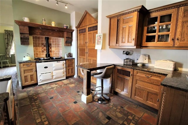 A beautifully appointed traditional style country kitchen with oil fuelled Aga and door to Dining Room.