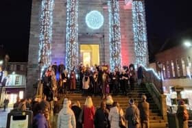 A picture from the community carol singing event in Berwick last year.