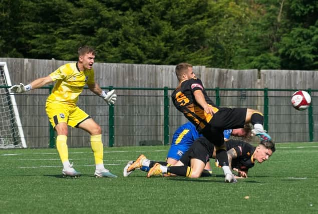Action from Morpeth Town's cup tie against Radcliffe, which Town won with a last-gasp winner. Picture: George Davidson