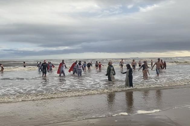 Some people managed to dip into the water, while others swam around for around 15 minutes.