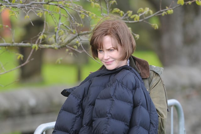 Nicole Kidman wraps up between scenes.