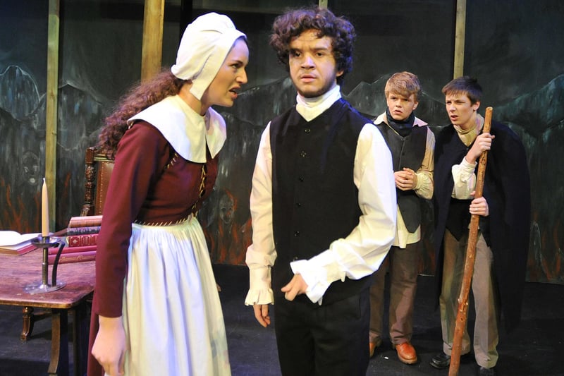 The Duchess's High School production of The Crucible by Arthur Miller at Alnwick Playhouse in November 2012. Pictured are Jess Williams as Abigail Williams and Barney Healy -Smith as Judge Danforth.