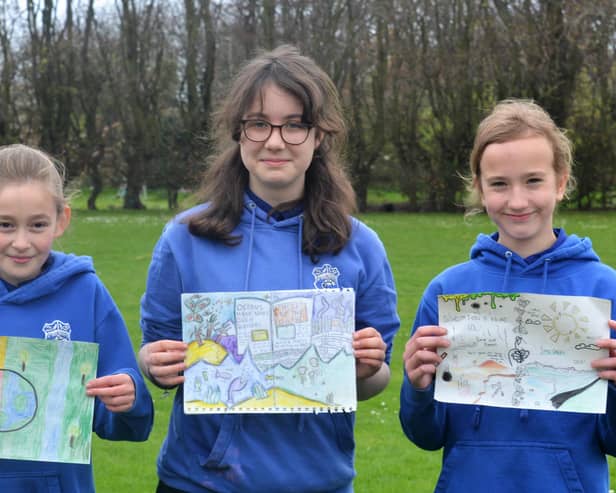 The first prize winner is Freya, centre, second prize winner is Amelia, right, and the third prize winner is Isla.