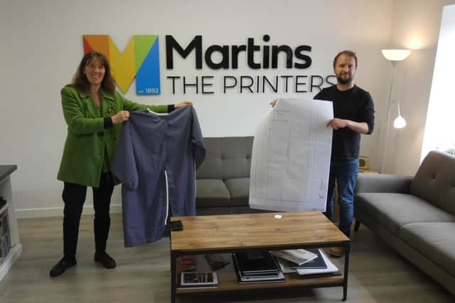 Annie Robinson and Andrew Hardie at Martins the Printers.