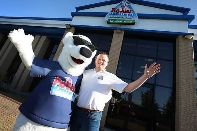 Michael Reid, CEO of Polar Krush, with the company's mascot.