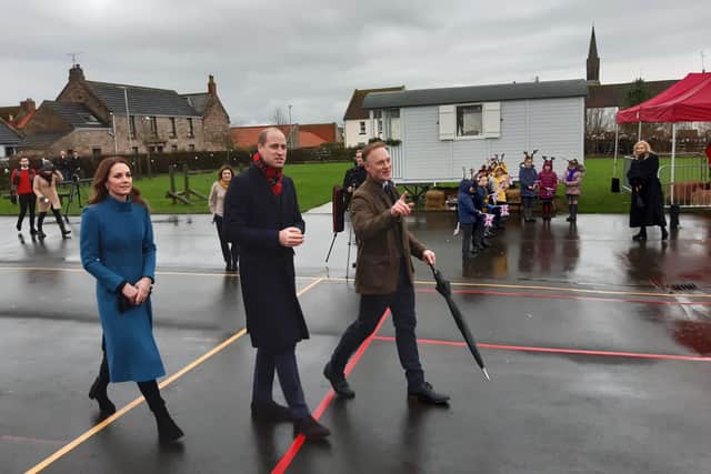 The Duke and Duchess of Cambridge with Holy Trinity First School head teacher Nick Shaw.
