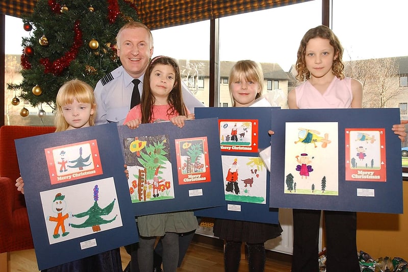 Children from Longhoughton First School who were winners of the Christmas card competition organised by RAF Boulmer in December 2004.