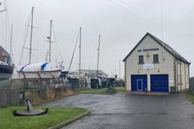 HM Coastguard officers were carrying out a training course in Amble when they were alerted to a woman who was hurt nearby.