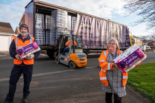 Chris Robertson, of Essity delivers 60,000 toilet rolls to Helen Rae, of Northumberland County Council at its shielding hub at Blyth Sports Centre.