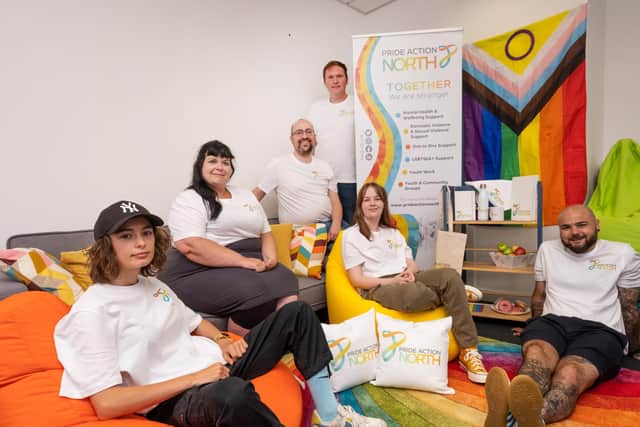 Some of the Pride Action North team reveal the charity's new brand.