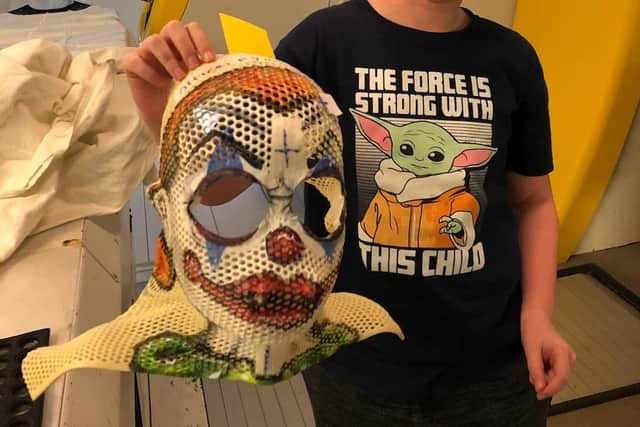 Ryan and his bespoke 'killer clown' mask which he had to wear during his proton beam therapy.
