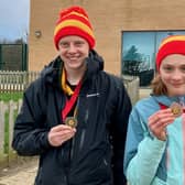 Liam McDonogh and Emilia Waugh with their medals. Picture: Joe Waugh