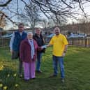 Wooler Parish Council presents Berwick Cancer Cars with £500.