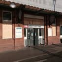 The windows at the front of the station have been boarded up after the raid, with the station now reopen to passengers.